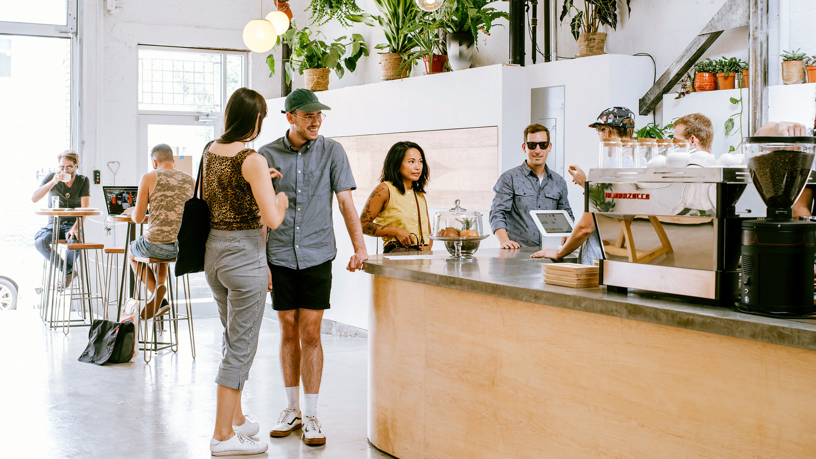 Small business team collaborating — restaurant, retail, or hotel operations